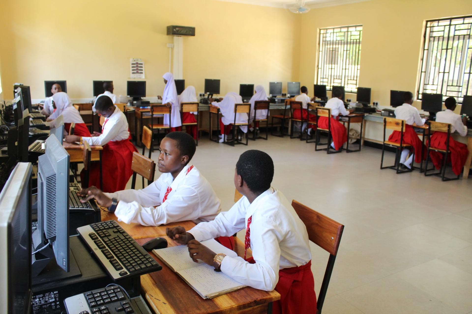 Bwiru Girls students celebrating academic achievement